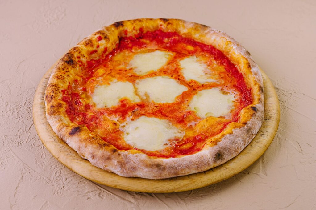 Traditional Neapolitan Pizza on wooden board