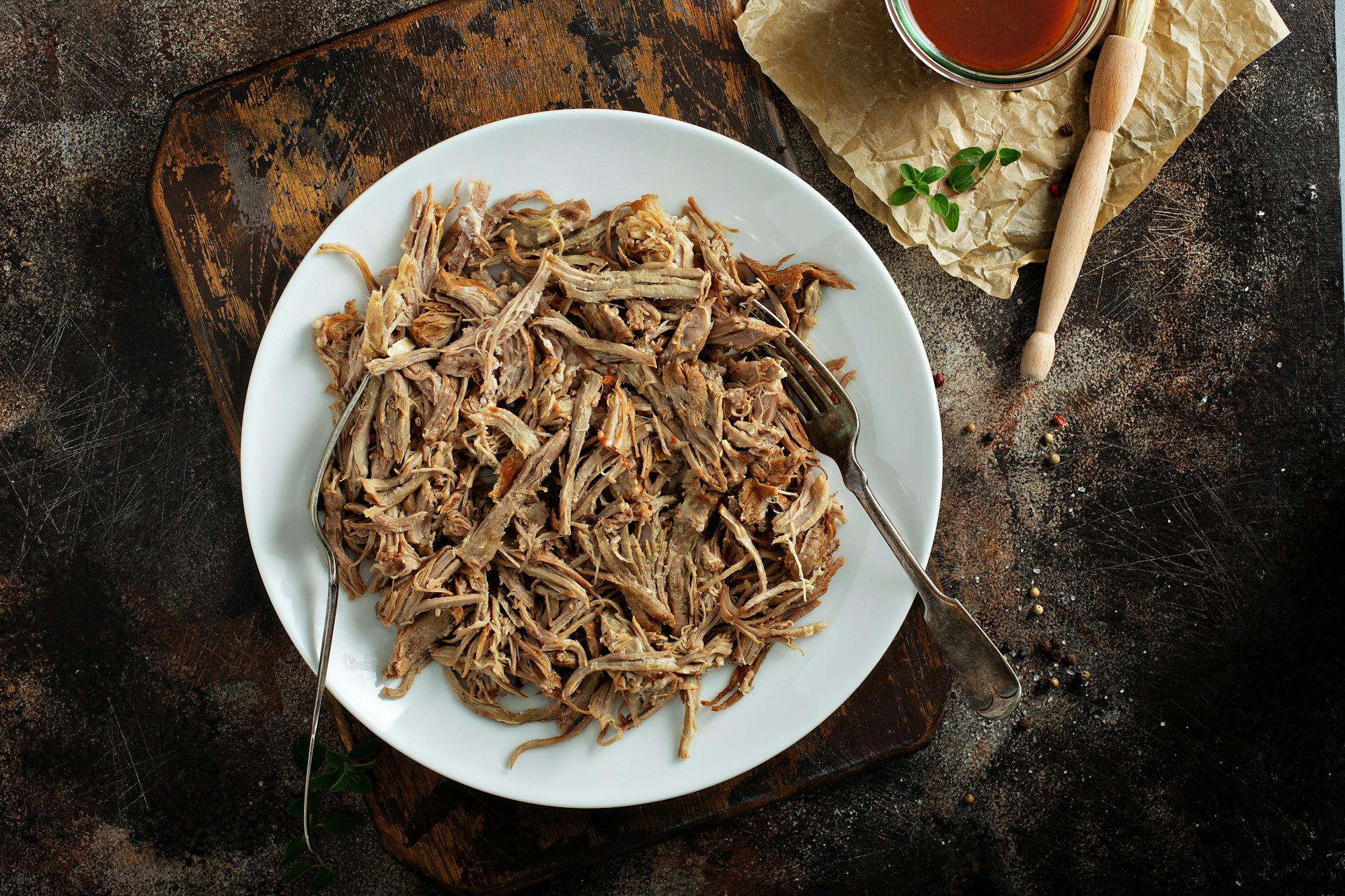 Pulled pork with forks on a plate